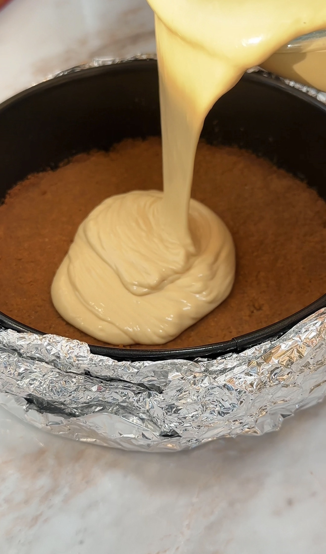 pour the cheesecake filling