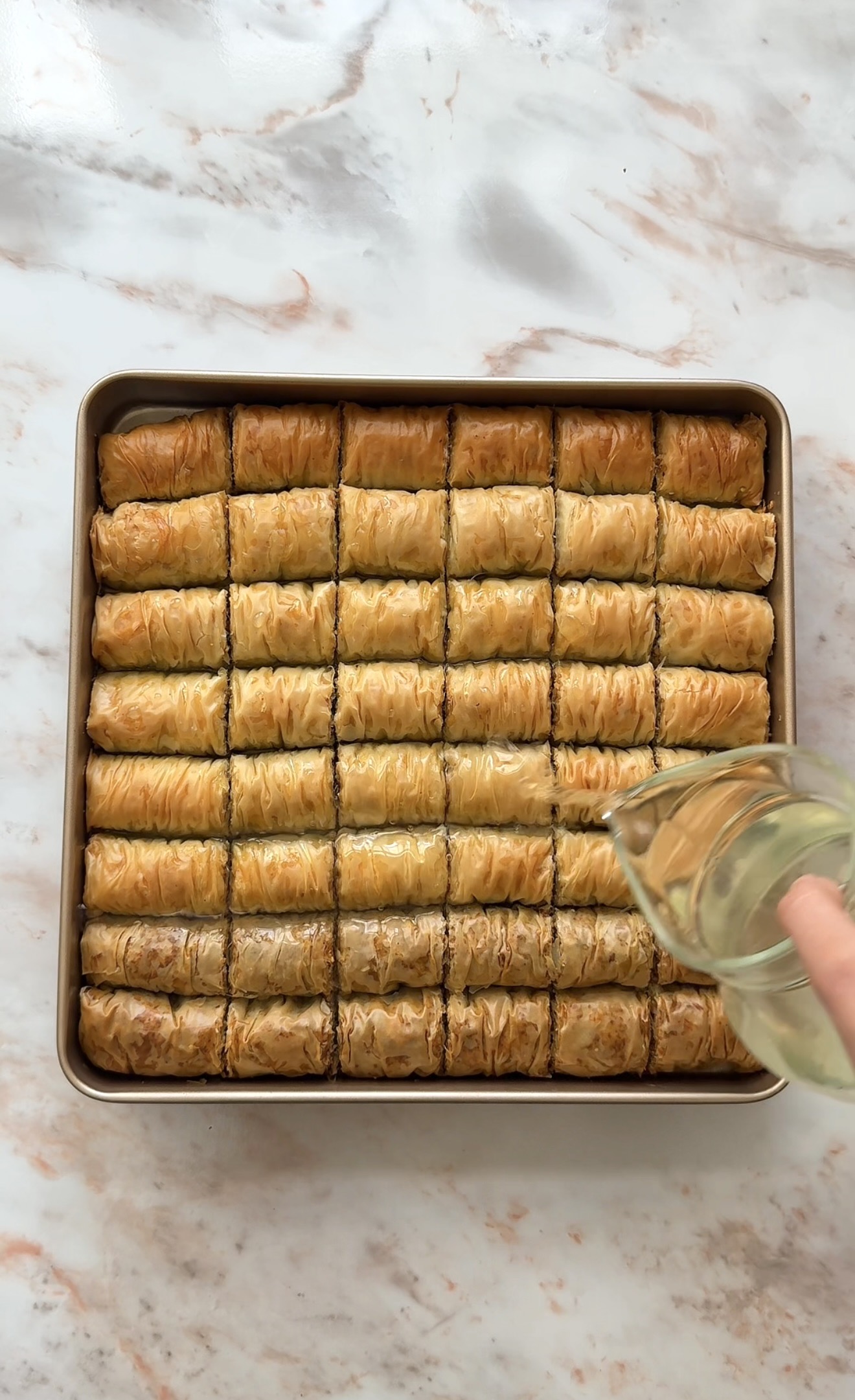 soak the baklava with syrup