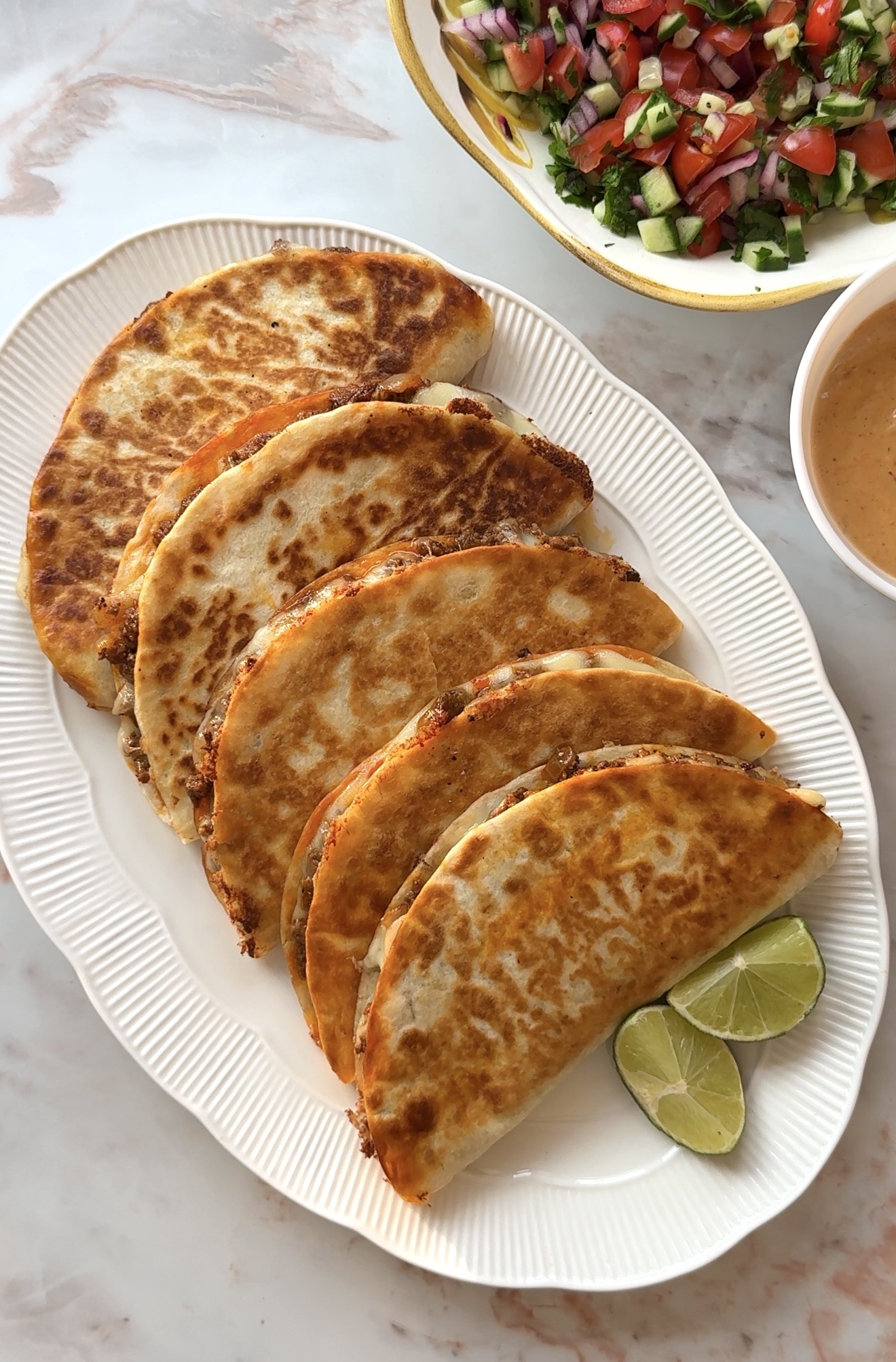 Crispy golden beef tacos filled with seasoned mince, melted cheese and fresh salsa